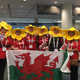 A group of Welsh midwives wear bonnets in the shape of Wales’s national flower, the daffodil, at the congress’s opening ceremony. Photo by Kathryn Jezer-Morton.